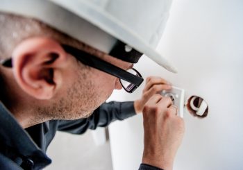 What are the benefits of hiring a professional electrician?